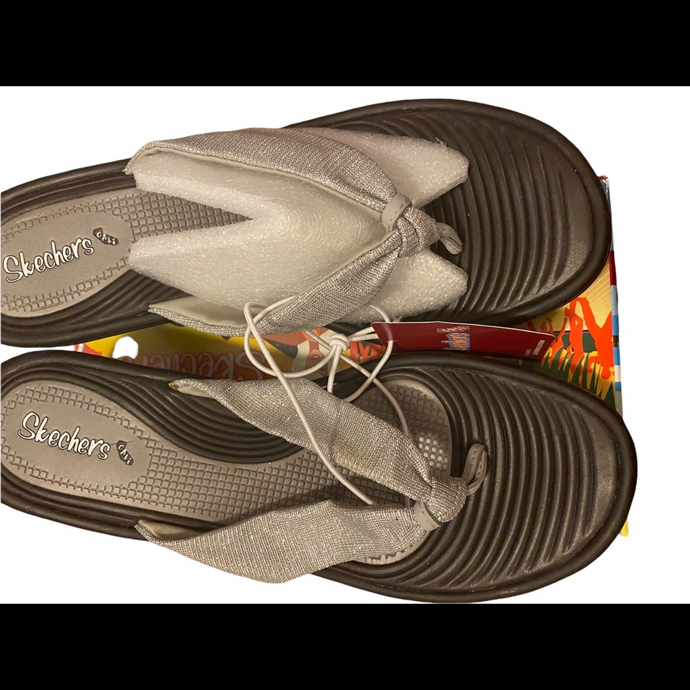 Silver/Black Sketcher’s with two inch heel